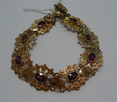 Lot 524 - Amethyst and gold bracelet