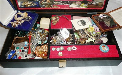 Lot 536 - A box containing silver and costume jewellery including beads, earrings, brooches, etc