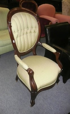 Lot 642 - Victorian style open armchair