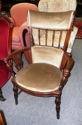 Lot 645 - An Edwardian mahogany elbow chair with turned legs