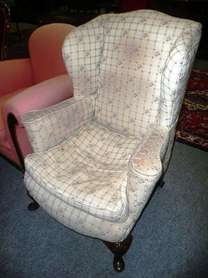 Lot 646 - 19th century wing back chair with carved shell forelegs