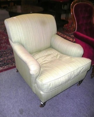 Lot 649 - Green upholstered armchair