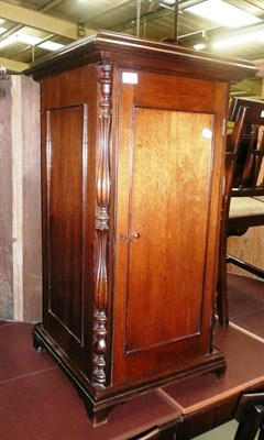 Lot 669 - Pedestal music cupboard