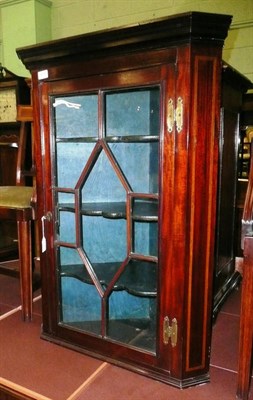 Lot 670 - Inlaid mahogany corner cupboard (with key)