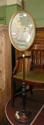 Lot 671 - Late 18th/early 19th century oval pole screen (damaged)