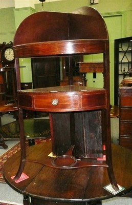 Lot 687 - A Georgian mahogany corner washstand