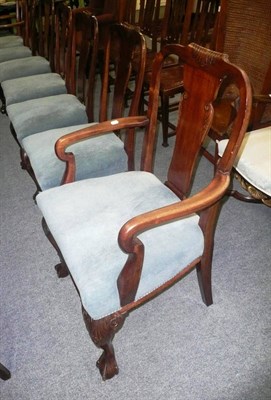 Lot 721 - A set of eight upholstered mahogany dining chairs on carved ball and claw feet