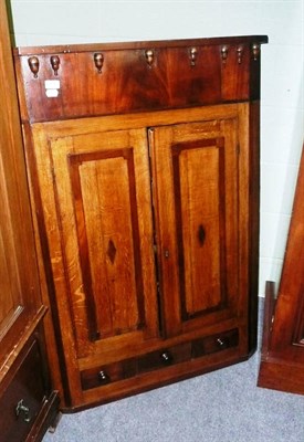 Lot 736 - A Georgian mahogany and oak corner cabinet