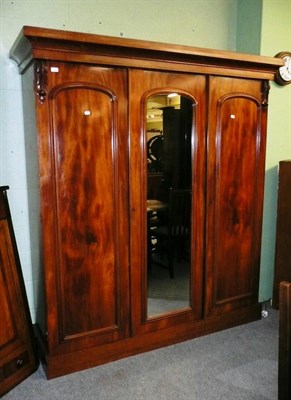 Lot 737 - A Victorian mahogany triple wardrobe