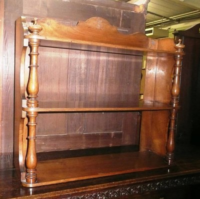 Lot 749 - A Victorian walnut hanging wall shelf