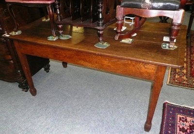 Lot 758 - An oak three plank farmhouse table