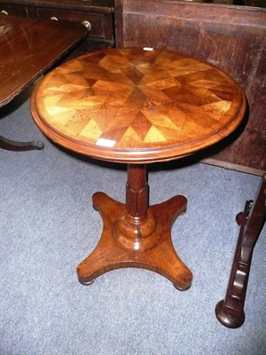 Lot 767 - 19th century parquetry top circular table on quadraform base