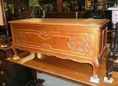 Lot 773 - French-style carved oak blanket box