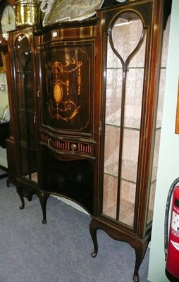 Lot 787 - Edwardian inlaid mahogany serpentine shaped display cabinet