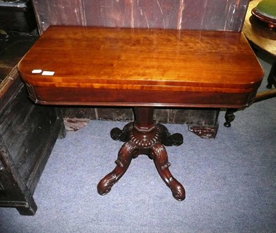 Lot 794 - A mahogany fold over card table