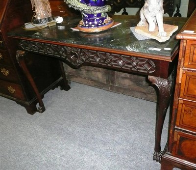 Lot 799 - Carved mahogany centre table with marble top