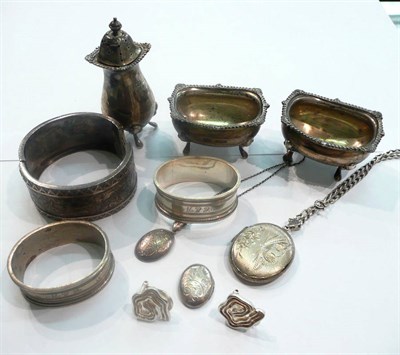 Lot 3 - A silver three piece cruet set, two napkin rings, a bangle, etc