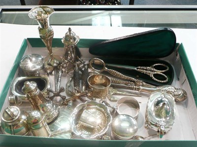 Lot 11 - A box of mixed silver and plated items including, silver pepper, silver handled button hook,...