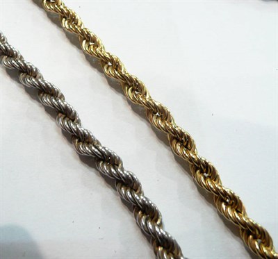 Lot 15 - A 9ct gold rope twist necklace and a bracelet, 19g and a similar silver necklace