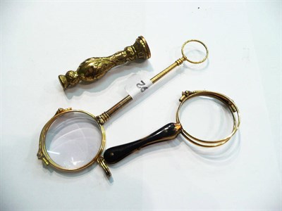 Lot 22 - Two pairs of Continental lorgnettes (one glass missing) and a gilded seal