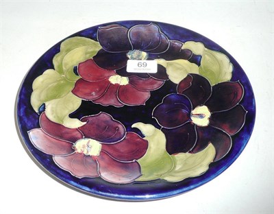 Lot 69 - A Walter Moorcroft 'Clematis' plate