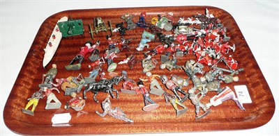 Lot 74 - A collection of hollowcast lead figures, two field guns and a Dinky liner