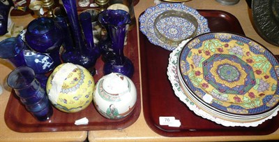 Lot 76 - Two trays including brass candlesticks, horn beakers, Doulton plates, Worcester part dessert...