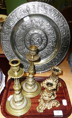 Lot 77 - Two pairs of brass candlesticks and a Continental metalware plaque