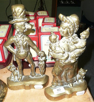 Lot 80 - Pair of brass door stops