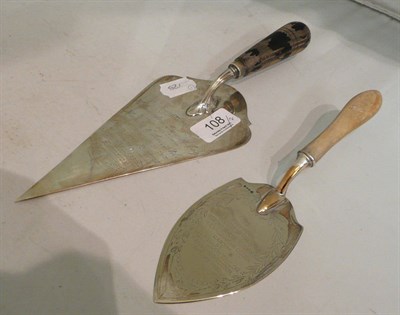 Lot 108 - Inscribed silver presentation trowel dated 1957 and another, smaller