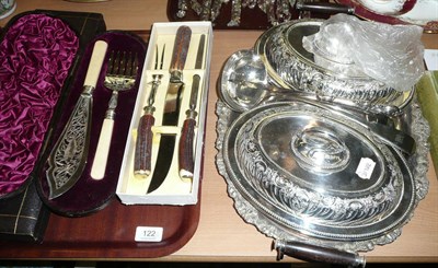 Lot 122 - A quantity of silver plated items including twin handled tray, two tureens and covers, two...