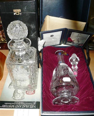 Lot 130 - Two boxed crystal decanters to commemorate the Silver Jubilee and the marriage of Lady Diana...