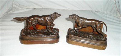 Lot 140 - A pair of bronze dog book ends