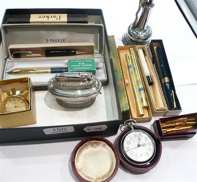 Lot 150 - Two Ronson lighters, nickel plated pocket watch, desk watch and Parker and Watermans fountain pens