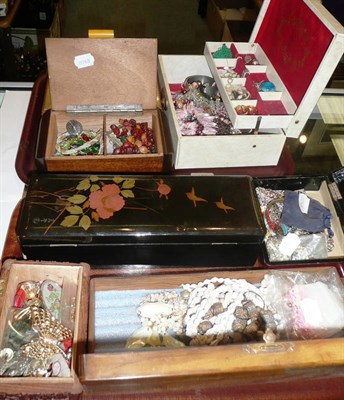 Lot 169 - Two trays of costume jewellery in seven boxes, including a rock crystal stone, beads, earrings etc