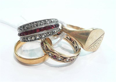 Lot 174 - 22ct gold wedding band, 9ct gold signet ring, eternity 'swivel' band set with coloured stones and a