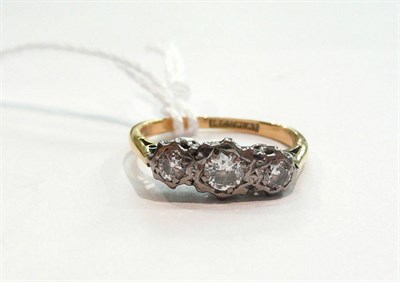 Lot 175 - 18ct gold and three stone diamond ring