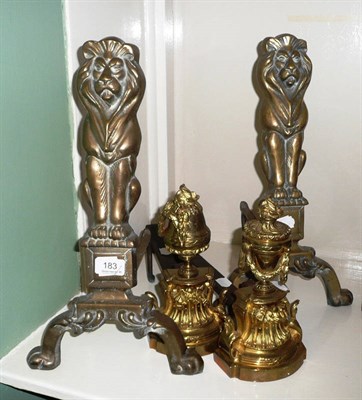 Lot 183 - Two pairs of brass fire dogs