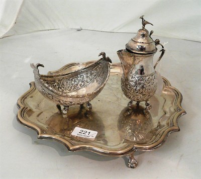 Lot 221 - A white metal salver, a white metal jug and a dish (3)