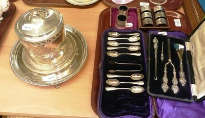 Lot 241 - Plated biscuit barrel, plated salver, cased set of six plated napkin rings, two plated salts, cased