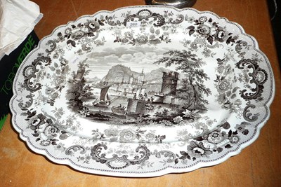 Lot 260 - A meat plate with gravy well, decorated with a harbour scene