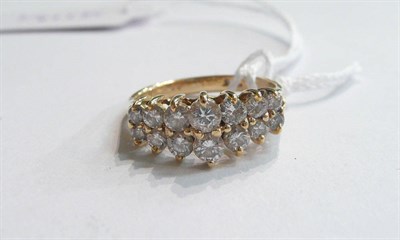 Lot 324 - A two row diamond ring