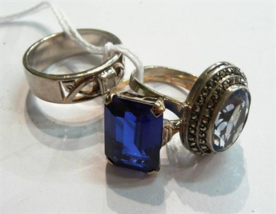 Lot 339 - A silver ring, a Continental marcasite ring and a blue stone ring