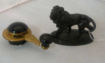 Lot 366 - Gilt metal mounted butler's bell pull and a spelter figure of a lion