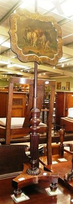 Lot 437 - George IV rosewood pole screen with papier mache panel