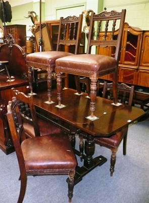 Lot 440 - Late Victorian oak drop-leaf table and six chairs