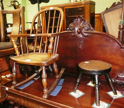 Lot 441 - A child's rocking Windsor chair and a stick stool