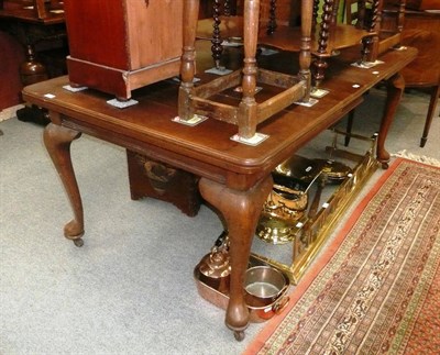 Lot 447 - Victorian oak wind out dining table