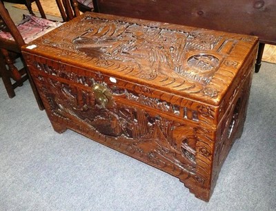 Lot 448 - A carved camphor wood box (the base drilled with holes) and a smaller camphor wood box