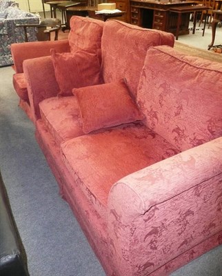 Lot 467 - Red upholstered two seater sofa and matching armchair